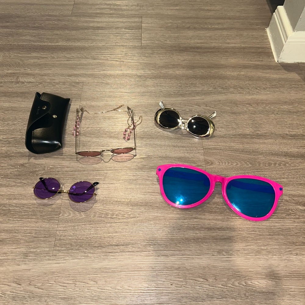 4 assorted rave glasses